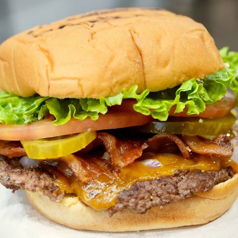 Wells Express SmashBurger smashed thin on the flat-top